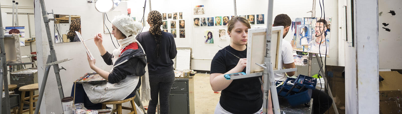 photo of art students working in a studio