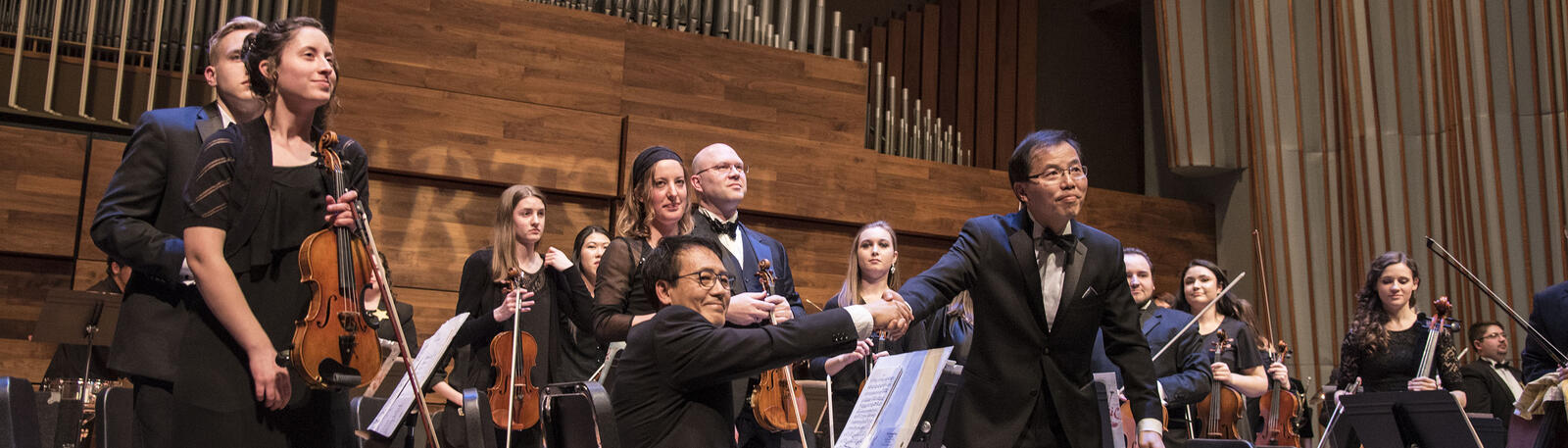 photo of music faculty and students performing