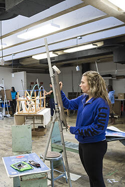 photo of a student in a studio art class